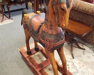 Hand carved polychrome rocking horse $250