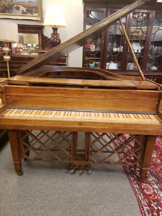 Piano Bar!!! Original baby grand piano case retrofitted and redesigned as a bar! Interior has been dropped to accommodate glassware...keys replaced for a "bar surface".  Below the keys are racks for wine. A fabulous conversation piece! $2500.