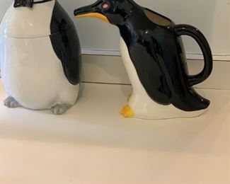   $45 (set)      POW 112.   Penguin cookie jar  and      pitcher; 12”h   and 10.5”h