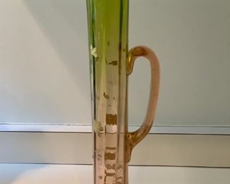 $25.      POR 104 orange/yellow art glass ever , 14”h