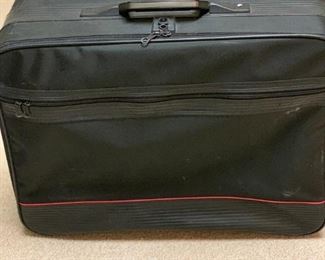  $8                 Front zipper luggage piece