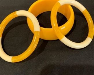 $18          3 pc      Bangle set yellow& yellow/beige , small 
                   wrist 3" dia