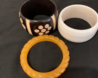 $18             3 pc Bangle set black/white/ gold/white, small 
                       wrist, 3" dia