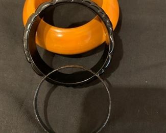 $12        3 Pc bangle set   Gold/black/black, small wrist 3" 
                 dia