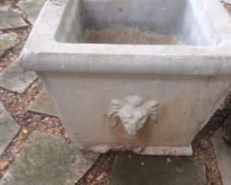 There are 4 of these concrete planters (heavy)