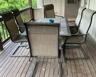 Tile Topped Outdoor Table with Six Rocker Chairs