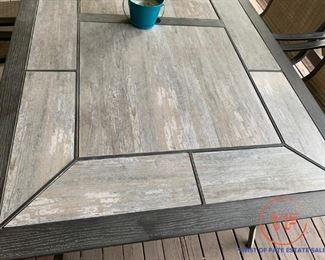 Tile Topped Outdoor Table with Six Rocker Chairs