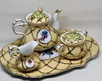 Lot 128
Porcelain 'N' Decor A Sevre Tea Set