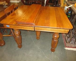 5 LEGGED SQ. SOLID OAK TABLE w/ TWO LEAVES