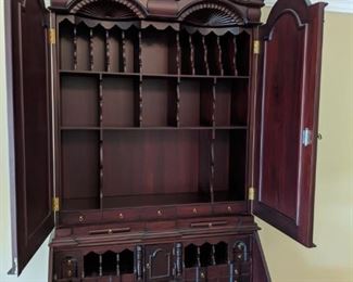 Giant Mahogany secretary built to order in Jakarta and only used for display purposes. Beautiful piece of furniture - approximately 9 feet tall at the tip, but selling at a price of about 1/10th what was paid for it.