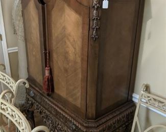 Restored Baroque cabinet with awesome wood work and craftsmanship, as well as inlay. Really good deal for someone who likes this style of furniture