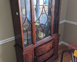 Display case with multiple drawers and cabinets