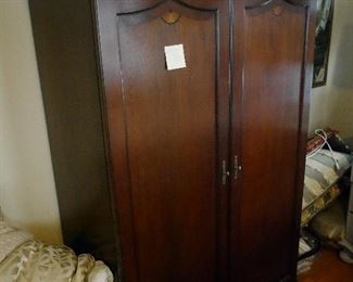 This is what the computer desk looks like when it's folded up - just looks like a cabinet/chifarobe 