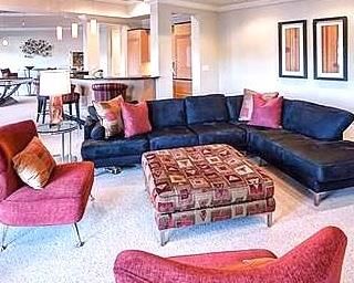 Contemporary L-shape sofa (approx. 10.5’ by 7.5’), by Carter. Chairs, and other pieces