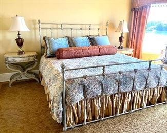 King size iron bed, mattress, custom linens & pillows, mattress/boxspring priced separately, (nightstands not for sale)