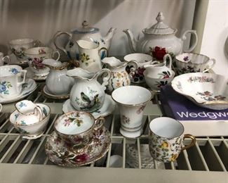 Many assorted Tea cups w/ saucers