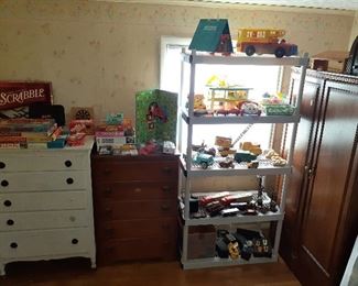 dressers, puzzles and games, Monopoly, Hopalong Cassidy game, Deluxe and travel Scrabble, Spill & Spell, Cribbage, Travel Sign Bingo
