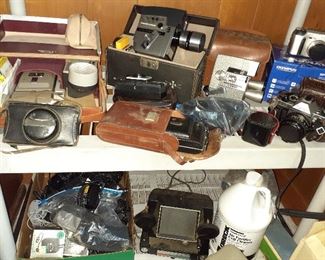 Canon AE1 camera, Olympus camera, Wollensak camera, Vivitar photo lens, Revere camera, Kodak Instamatic, Dick Tracey camera, Polaroid land camera, Sears 8mm editor, Keystone projector and tripod