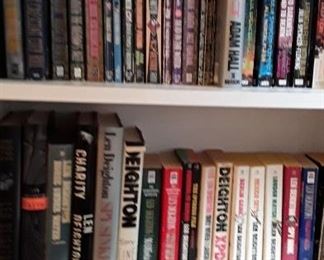 Book collections by JK Rowling, Clive Cussler, Martin Cruz Smith, Dick Francis, John D MacDonald, Robert Ludlum, Len Deighton, Julie Smith, Patricia Cornwell, 
PG Wodehouse and bookshelves. Not all collections pictured - see list. 
