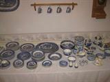BLUE WILLOW CHINA INCLUDING: WILLOW WARE; STAFFORDSHIRE; CHURCHHILL; MADE IN ENGLAND, HOLLAND AND IN OTHER COUNTRIES. ALSO HAVE CANISTER SET, MULTIPLE TEA POTS, SERVING PLATTERS, AND BOWLS.