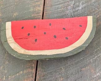 $30 Wedge of wood painted like a watermelon 