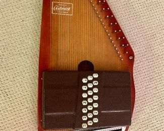 $120 Appalachian Auto harp  includes sheet music and case 24"L by 12"W
