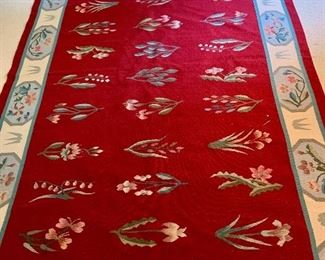 $325  Red floral  wool carpet 102" long by 67" wide