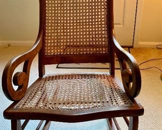 $80 Caned rocking chair 41"L by 21" W  by 31 " deep (seat is 19" deep) 1 available