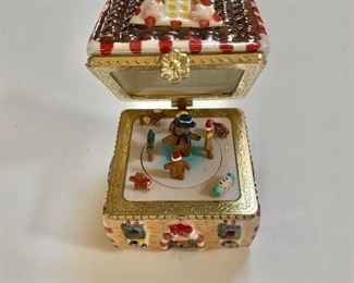 $20 Christmas hinged, musical ornament (open)