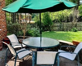 $200 for all patio set. Table 54" diam; chairs 33" H, 25" W, 25" D. 