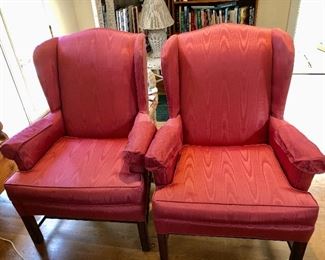 $250 Pair wing backed raspberry  chairs