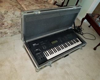 Yamaha SY77 synthesizer with heavy duty aluminum travel case