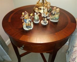 pair 24" round wooden end tables, with drawers, with Goebels/Hummels