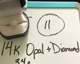 D-J-11  $400  14k Opal and Diamond ring