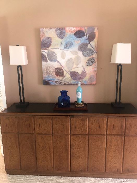 Mid-Century sideboard with a black top -  $750 and a pair of iron lamps $200