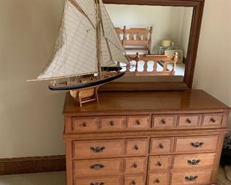 Solid wood dresser, wooden sailboat model