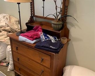Antique dresser, linens 