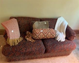 Pull out sleep sofa with pillows and linens