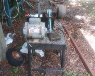 Craftsman grinder with motor and stand.