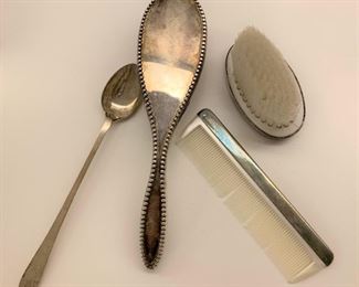 Silverplate items including a sterling silver Tiffany Spoon - $35