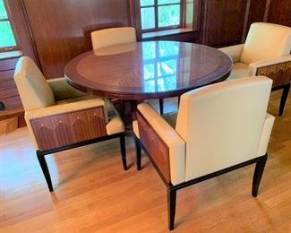 Custom Made Art Deco Style Table and Leather Chairs - $1500 - Table 30"H x 54" Diameter. Chairs 35"H x 27"W x24"D. A few nicks to the black lacquer finish on the legs.