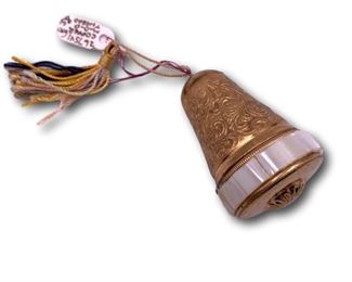 Gilt and mother of pearl thimble and thread holder. Bidding ends at 3 p.m. on 7-20-2020. Register at https://auctions.mlestatesales.com. Don't forget to check out our other auctions too!