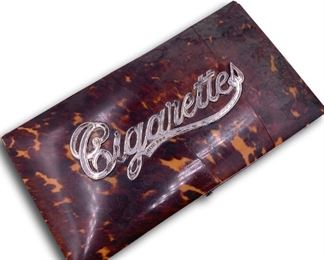 Vintage faux tortoise shell and sterling silver cigarette box. Bidding ends at 3 p.m. on 7-20-2020. Register at https://auctions.mlestatesales.com. Don't forget to check out our other auctions too!