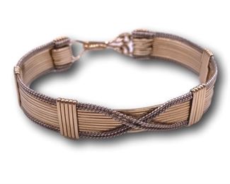 Mixed metals bracelet. Bidding ends at 3 p.m. on 7-20-2020. Register at https://auctions.mlestatesales.com. Don't forget to check out our other auctions too!