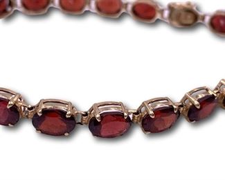 14K gold garnet bracelet. Bidding ends at 3 p.m. on 7-20-2020. Register at https://auctions.mlestatesales.com. Don't forget to check out our other auctions too!