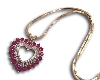 14K Gold, diamond and ruby heart pendant necklace. Bidding ends at 3 p.m. on 7-20-2020. Register at https://auctions.mlestatesales.com. Don't forget to check out our other auctions too!