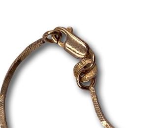 14K Gold, diamond and ruby heart pendant necklace. Bidding ends at 3 p.m. on 7-20-2020. Register at https://auctions.mlestatesales.com. Don't forget to check out our other auctions too!