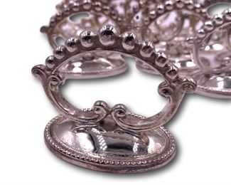 Collection of Bergdorf Goodman napkin rings. Bidding ends at 3 p.m. on 7-20-2020. Register at https://auctions.mlestatesales.com. Don't forget to check out our other auctions too!