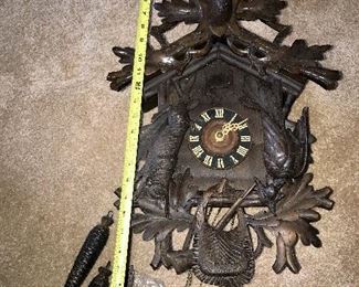 We just unpacked this wonderful Black Forest Cuckoo   Clock its about 2 ft long From Deer with antlers to fishing bag ( more info soon )