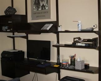 Mid century adjustable wall shelves.